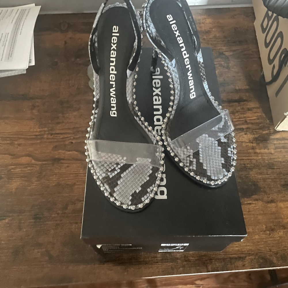 Alexander wang nova snake print 4 inch heel size 39.5, runs true to size.
